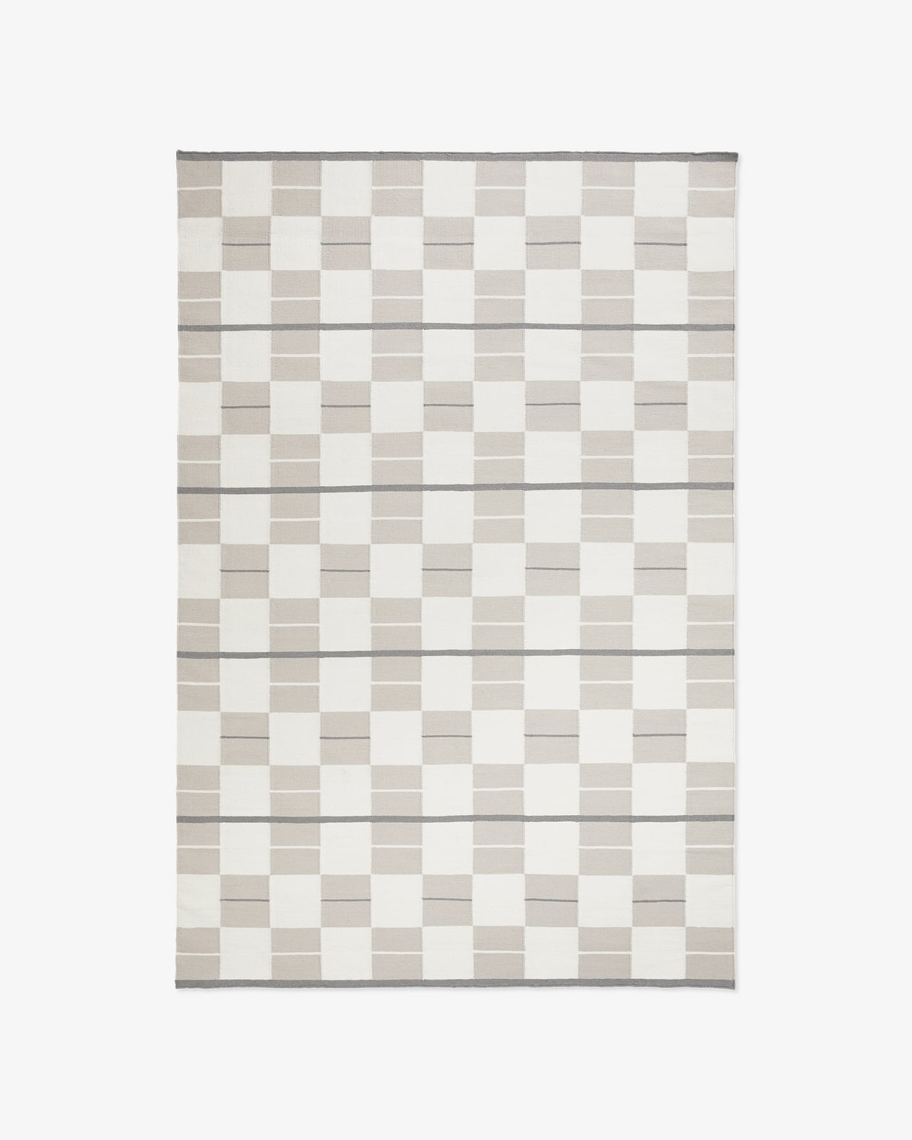 Båstad flatweave rug in Cream featuring a subtle checkerboard pattern in tonal neutrals with horizontal lines.